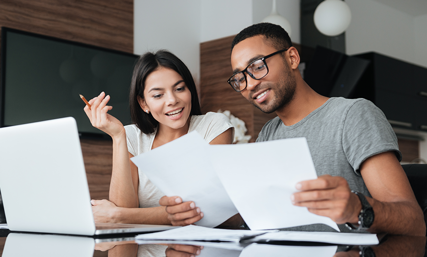 Couple looking at paperwork 