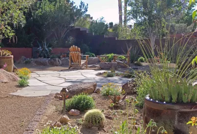 a backyard with patio furniture